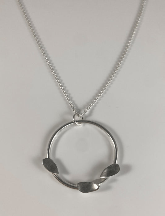 Abstract Sterling Silver Circle Pendant with Petals