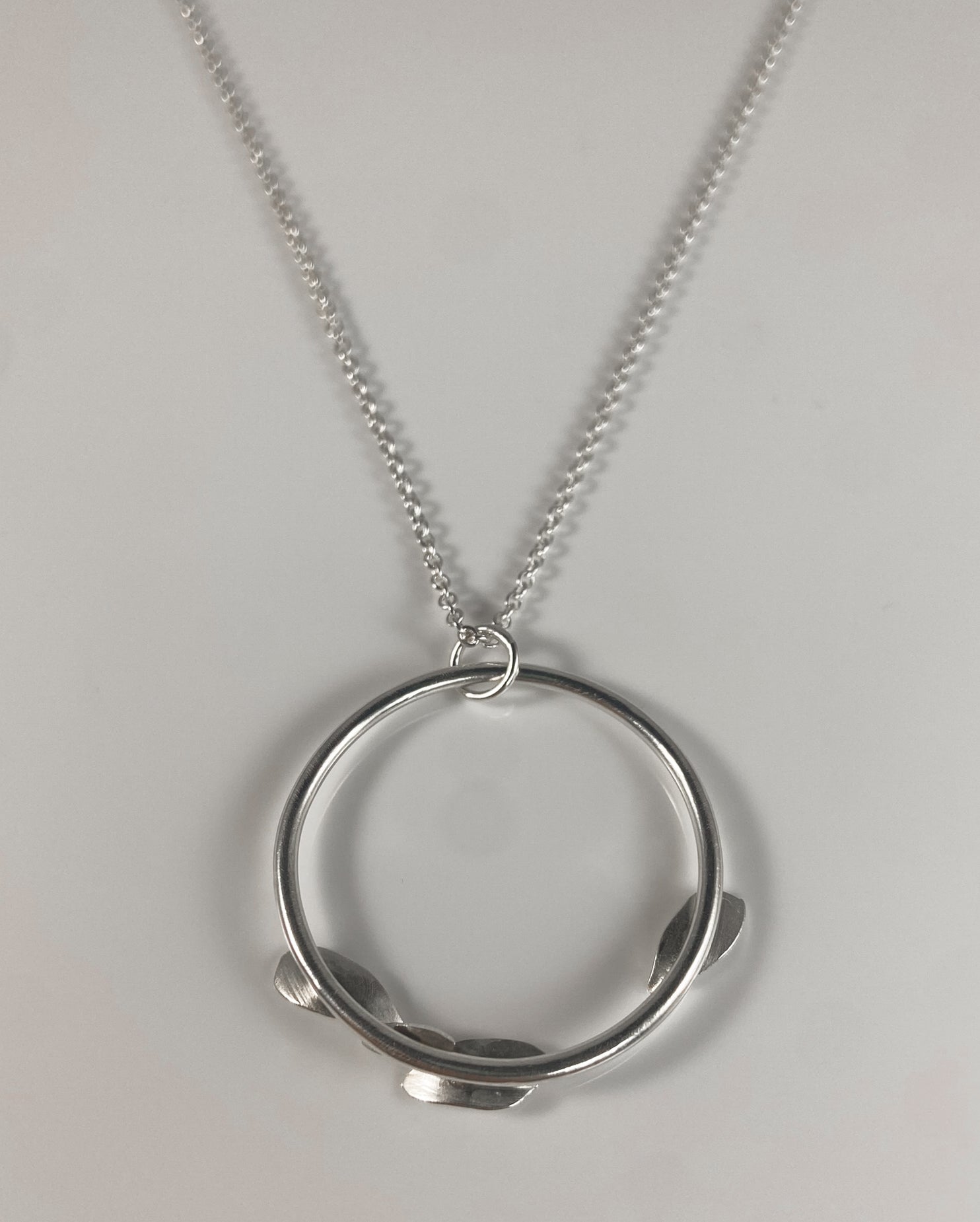 Abstract Sterling Silver Circle Pendant with Petals