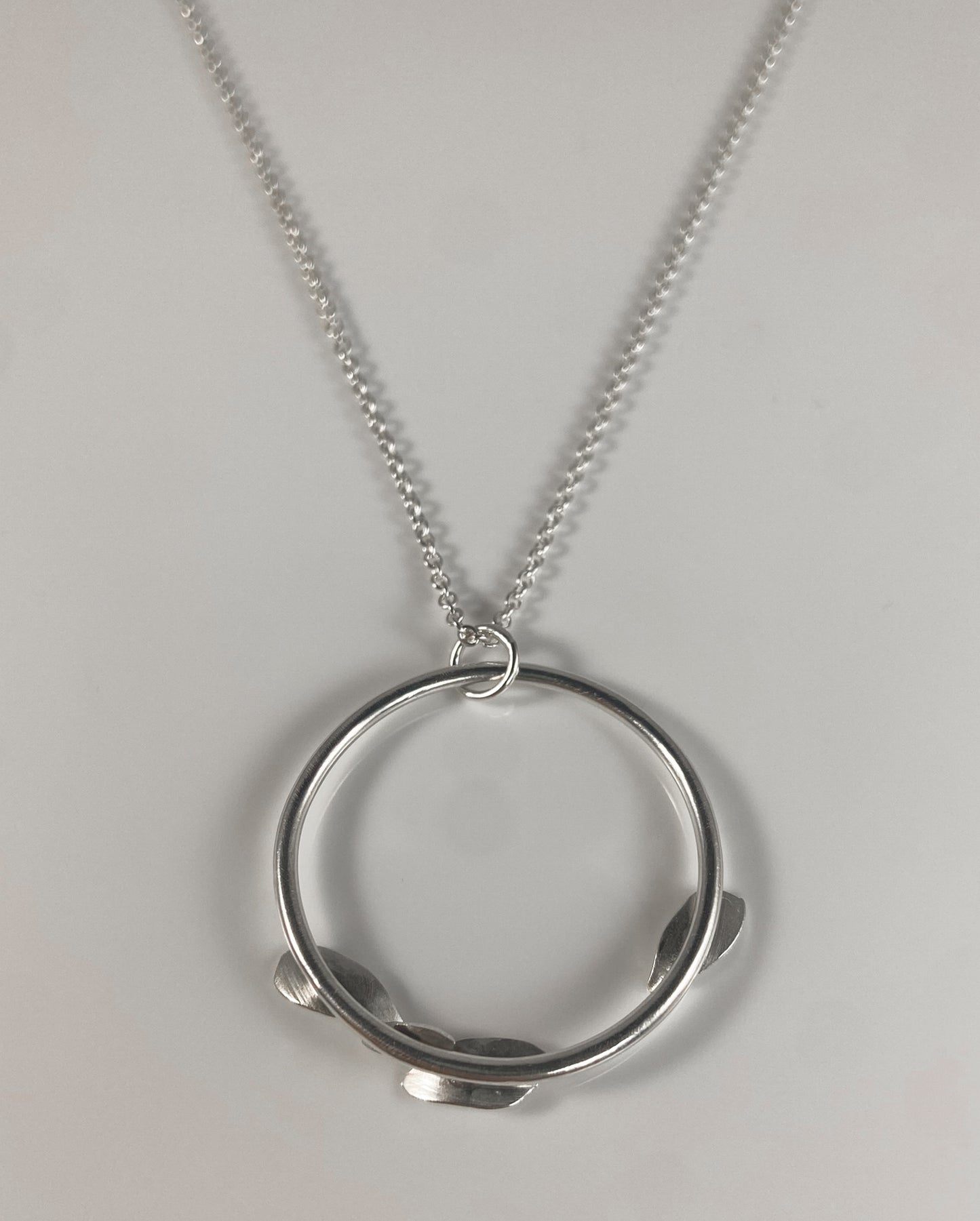 Abstract Sterling Silver Circle Pendant with Petals